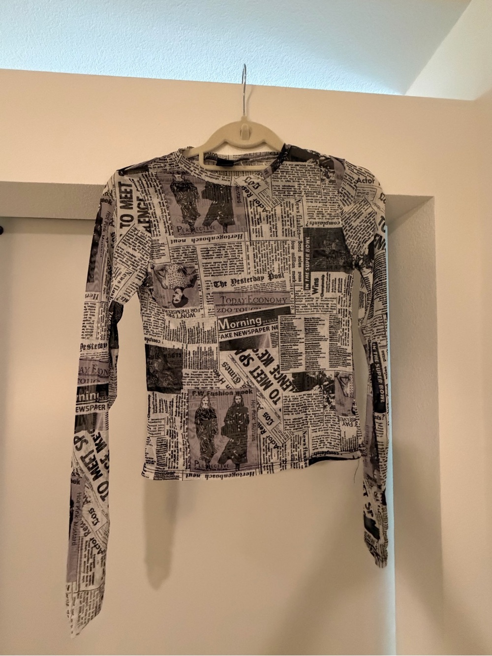 Polly & Esther Black and White Newspaper Print Long-Sleeve Top